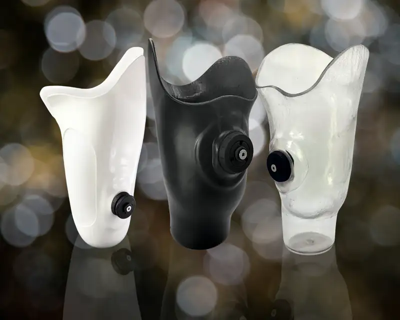 three prosthetics of white and black colors
